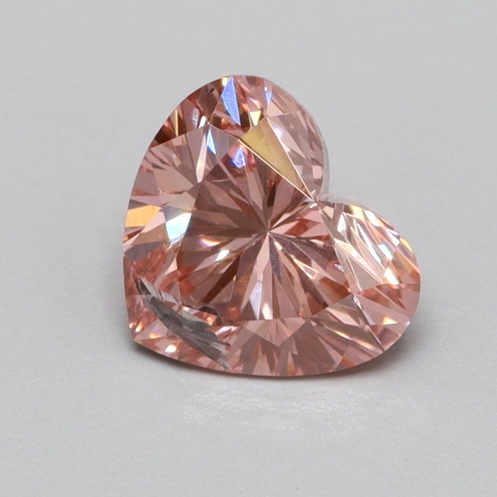 Loose Diamond - HEART 0.46ct Fancy Vivid Pink I2: Loose Diamond - HEART 0.46ct Fancy Vivid Pink I2 Source: This is a real non-mined Diamond that has been grown in a lab Shape: HEART Carats: 0.46 Color: Fancy Vivid Pink Certification: NONE Video: