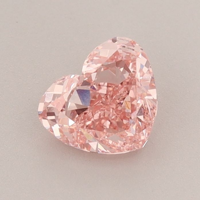 Loose Diamond - HEART 0.87ct Fancy Vivid Pink VS1: Loose Diamond - HEART 0.87ct Fancy Vivid Pink VS1 Source: This is a real non-mined Diamond that has been grown in a lab Shape: HEART Carats: 0.87 Color: Fancy Vivid Pink Certification: IGI Video: