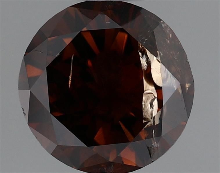 Loose Diamond - ROUND 0.85ct Fancy Dark Orangey Brown: Loose Diamond - ROUND 0.85ct Fancy Dark Orangey Brown Source: Natural Shape: ROUND Carats: 0.85 Color: Fancy Dark Orangey Brown Certification: GIA Video: