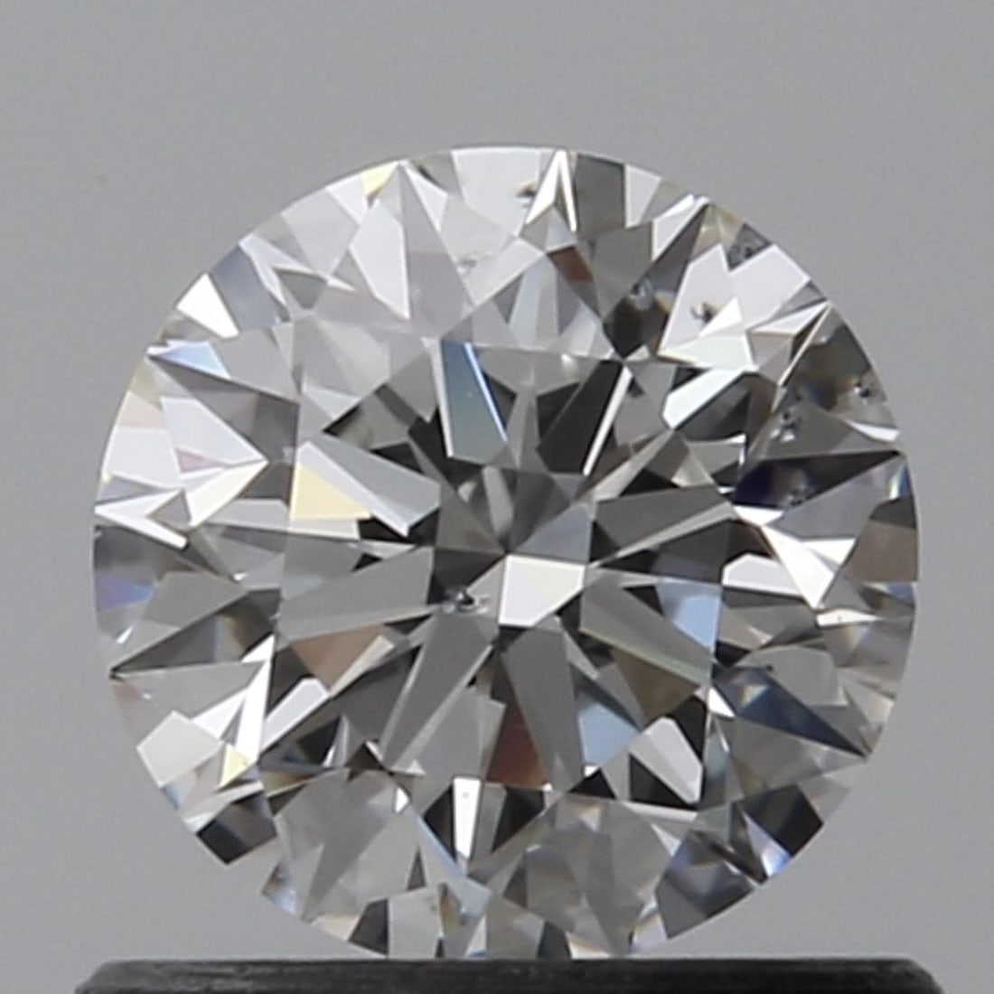 Loose Diamond - ROUND 0.69ct E SI1: Loose Diamond - ROUND 0.69ct E SI1 Source: Natural Shape: ROUND Carats: 0.69 Color: E Clarity: SI1 Certification: GIA Video: