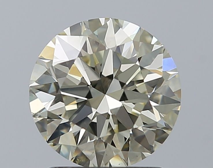 Loose Diamond - ROUND 1.56ct O-P SI1: Loose Diamond - ROUND 1.56ct O-P SI1 Source: Natural Shape: ROUND Carats: 1.56 Color: O-P Certification: GIA Video: