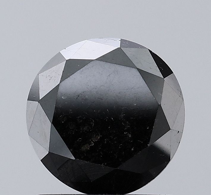 Loose Diamond - ROUND 1.75ct Fancy Black VVS2: Loose Diamond - ROUND 1.75ct Fancy Black VVS2 Source: Natural Shape: ROUND Carats: 1.75 Color: Fancy Black Certification: NONE Video: