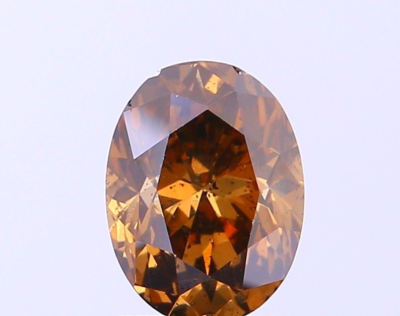 Loose Diamond - OVAL 1.3ct Fancy Dark Brown SI2: Loose Diamond - OVAL 1.3ct Fancy Dark Brown SI2 Source: Natural Shape: OVAL Carats: 1.3 Color: Fancy Dark Brown Certification: NONE Video: