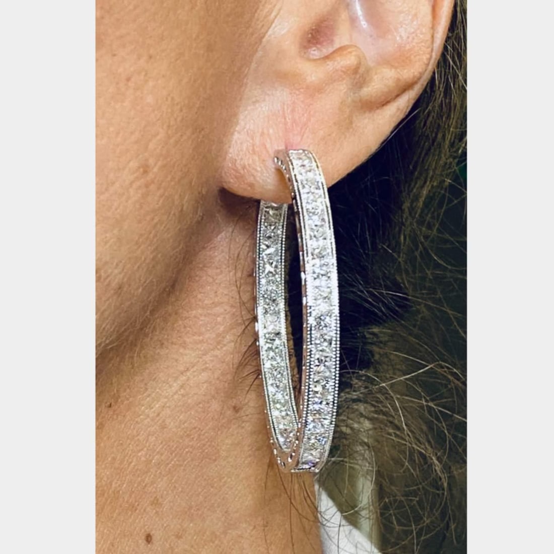 Stunning 18K White Gold 12.60 Ct Diamond Hoop Earrings: Stunning 18K White Gold 12.60 Ct Diamond Hoop Earrings Elevate your elegance with these stunning 18K White Gold Hoop Earrings, featuring a breathtaking total of 12.60 carats of diamonds. These earring