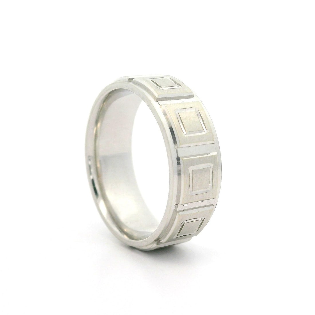 14k White Gold 6.9mm Wide Square Eternity Wedding Band: 14k White Gold 6.9mm Wide Square Eternity Wedding Band This elegant unisex wedding band features a striking square pattern design crafted from solid 14k white gold, making it a timeless choice for cou
