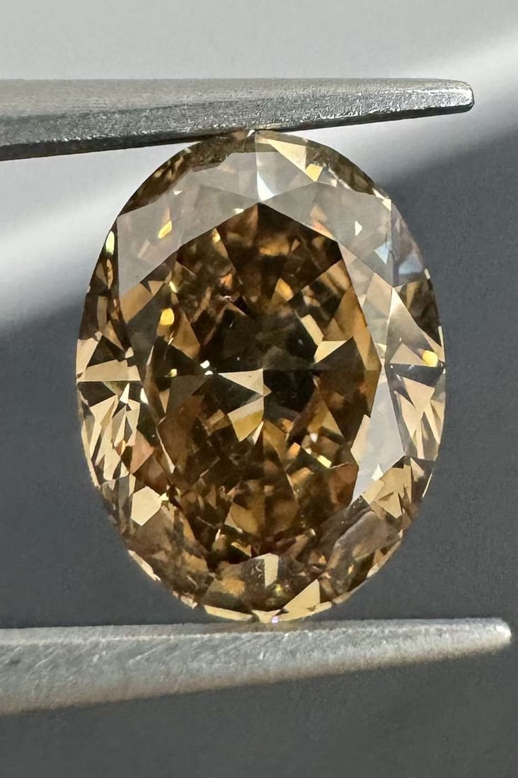 Loose Diamond - OVAL 2.01ct Fancy Deep Brown Orange SI1: Loose Diamond - OVAL 2.01ct Fancy Deep Brown Orange SI1 Source: Natural Shape: OVAL Carats: 2.01 Color: Fancy Deep Brown Orange Certification: GIA Video: