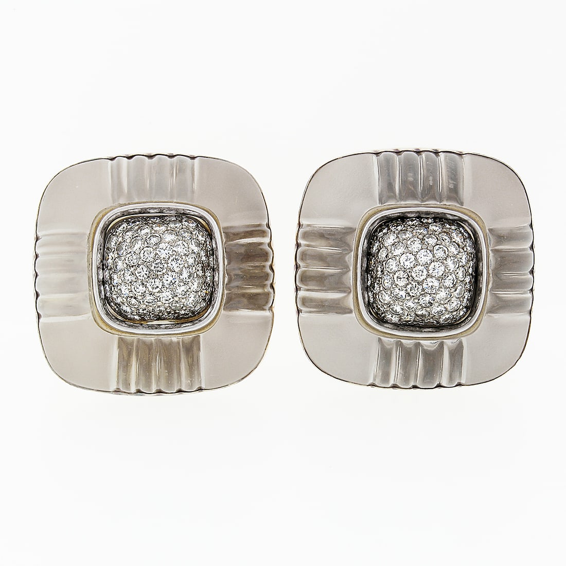 Trianon Vintage 14k Two Tone Gold Rock Crystal Diamond Clip-On Earrings: Trianon Vintage 14k Two Tone Gold Rock Crystal Diamond Clip-On Earrings This exquisite pair of vintage Trianon earrings features a stunning design crafted from solid 14k two-tone gold. Each earring sh