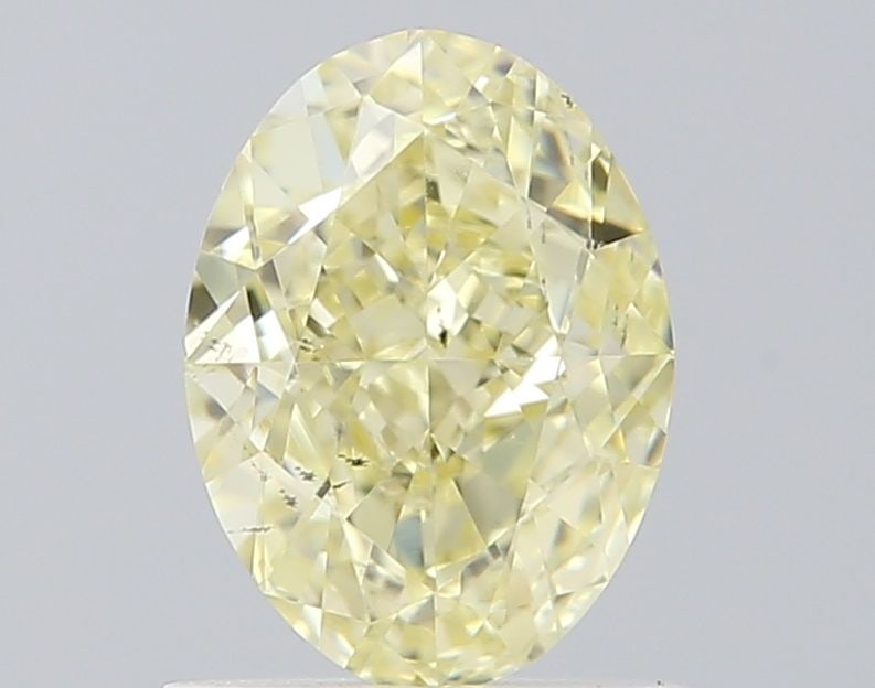 Loose Diamond - OVAL 1.01ct Fancy Light Yellow SI2: Loose Diamond - OVAL 1.01ct Fancy Light Yellow SI2 Source: Natural Shape: OVAL Carats: 1.01 Color: Fancy Light Yellow Certification: GIA Video: