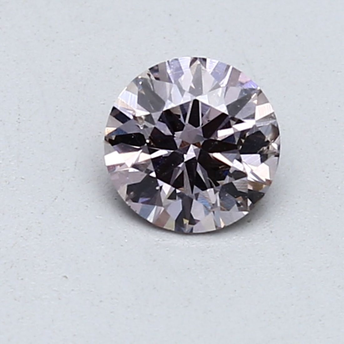 Loose Diamond - ROUND 0.59ct Fancy Brown Purple SI2: Loose Diamond - ROUND 0.59ct Fancy Brown Purple SI2 Source: Natural Shape: ROUND Carats: 0.59 Color: Fancy Brown Purple Certification: GIA Video: