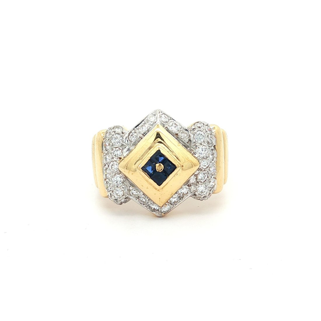 Unisex 18k Yellow Gold .60ctw Diamond Sapphire Geometric Band Ring: Unisex 18k Yellow Gold .60ctw Diamond Sapphire Geometric Band Ring This stunning unisex wide band ring is crafted from solid 18k yellow and white gold and features a striking geometric design. It show