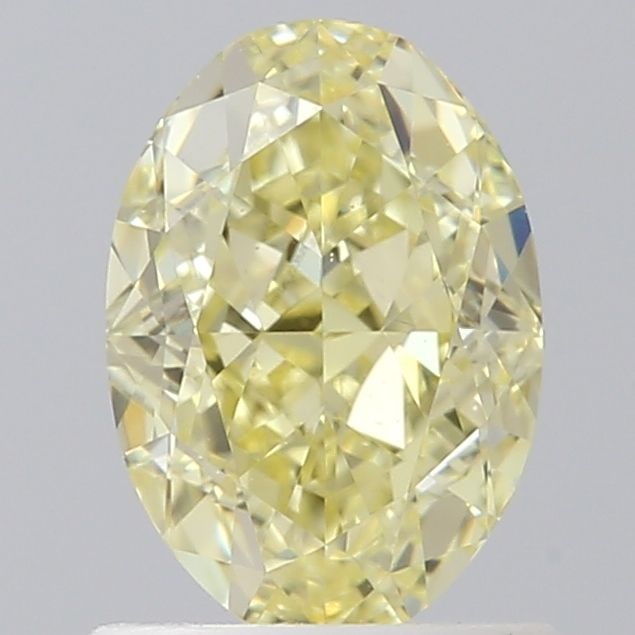 Loose Diamond - OVAL 0.95ct Fancy Yellow VVS1: Loose Diamond - OVAL 0.95ct Fancy Yellow VVS1 Source: Natural Shape: OVAL Carats: 0.95 Color: Fancy Yellow Certification: GIA Video: