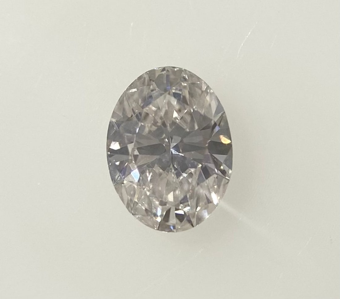 Loose Diamond - OVAL 0.7ct Faint Pinkish Brown SI2: Loose Diamond - OVAL 0.7ct Faint Pinkish Brown SI2 Source: Natural Shape: OVAL Carats: 0.7 Color: Faint Pinkish Brown Certification: GIA The Diamond Depot Guarantee: All items in this auction are guar