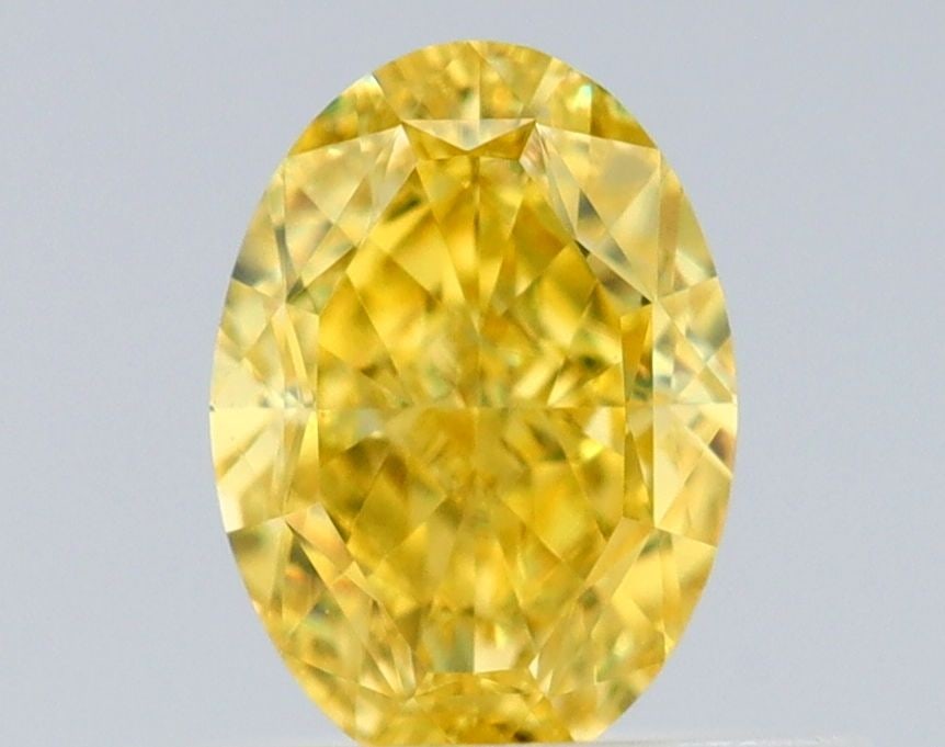 Loose Diamond - OVAL 0.54ct Fancy Vivid Yellow VVS1: Loose Diamond - OVAL 0.54ct Fancy Vivid Yellow VVS1 Source: Natural Shape: OVAL Carats: 0.54 Color: Fancy Vivid Yellow Certification: GIA Video:
