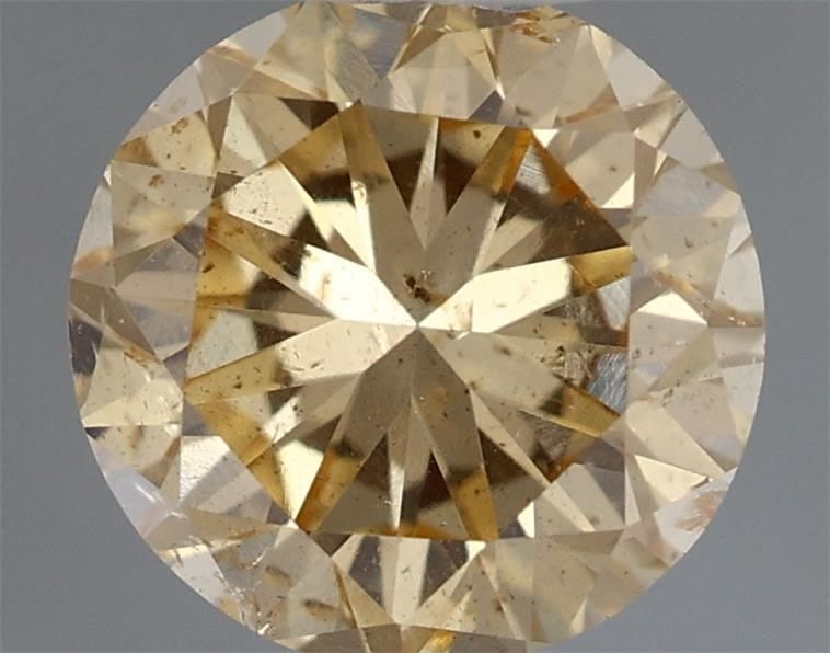 Loose Diamond - ROUND 0.62ct Fancy Orange Yellow: Loose Diamond - ROUND 0.62ct Fancy Orange Yellow Source: Natural Shape: ROUND Carats: 0.62 Color: Fancy Orange Yellow Certification: GIA Video: