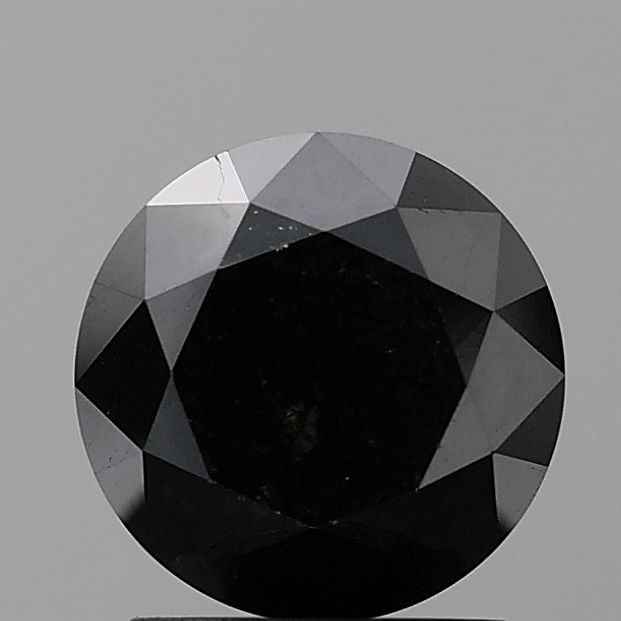 Loose Diamond - ROUND 1.22ct Fancy Black VVS2: Loose Diamond - ROUND 1.22ct Fancy Black VVS2 Source: Natural Shape: ROUND Carats: 1.22 Color: Fancy Black Certification: NONE Video:
