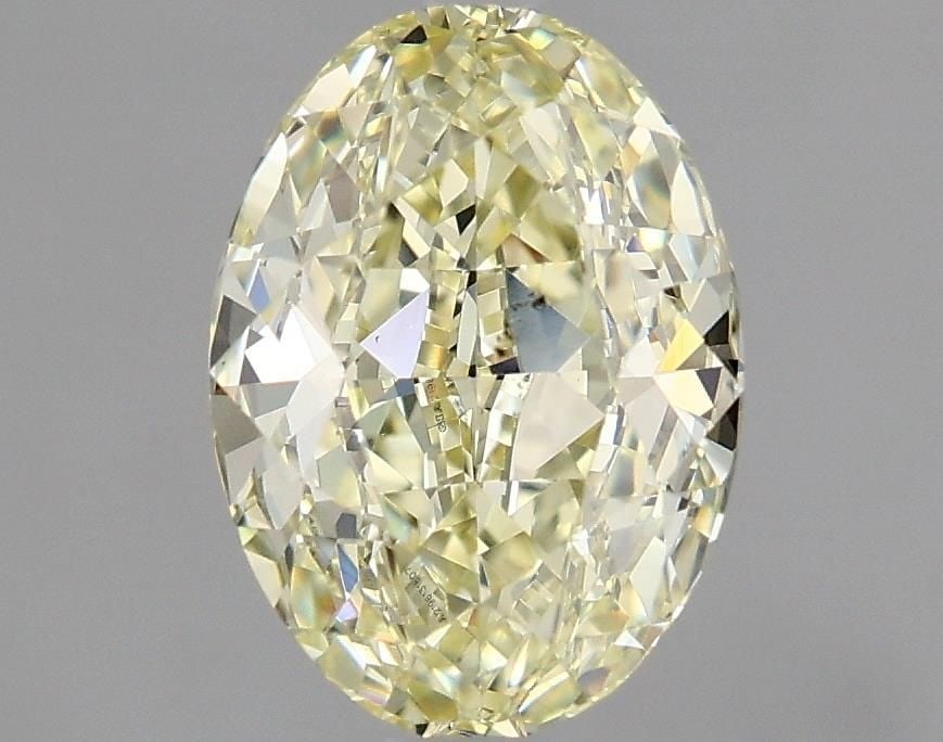 Loose Diamond - OVAL 1.3ct Fancy Light Yellow SI1: Loose Diamond - OVAL 1.3ct Fancy Light Yellow SI1 Source: Natural Shape: OVAL Carats: 1.3 Color: Fancy Light Yellow Certification: GIA Video: