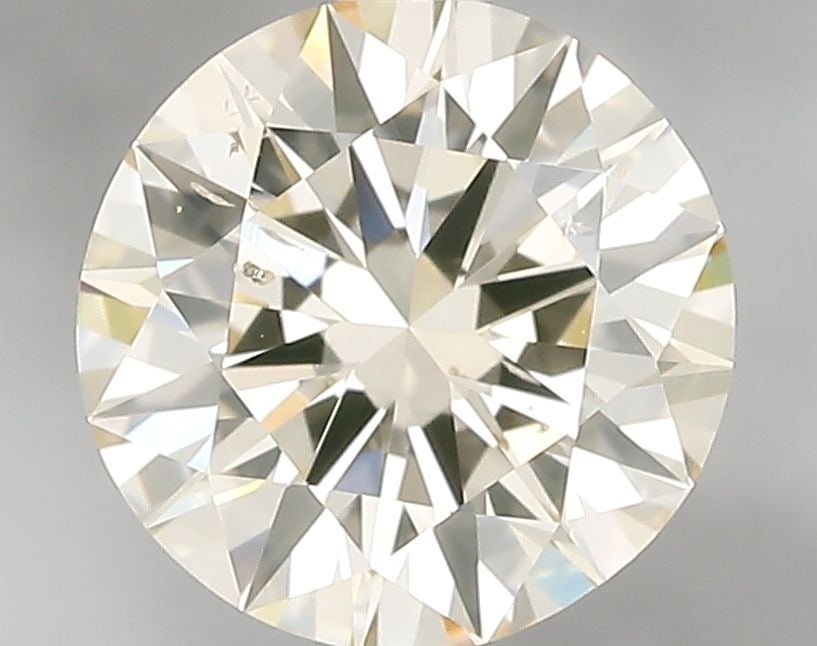 Loose Diamond - ROUND 1.51ct O-P SI1: Loose Diamond - ROUND 1.51ct O-P SI1 Source: Natural Shape: ROUND Carats: 1.51 Color: O-P Certification: GIA Video: