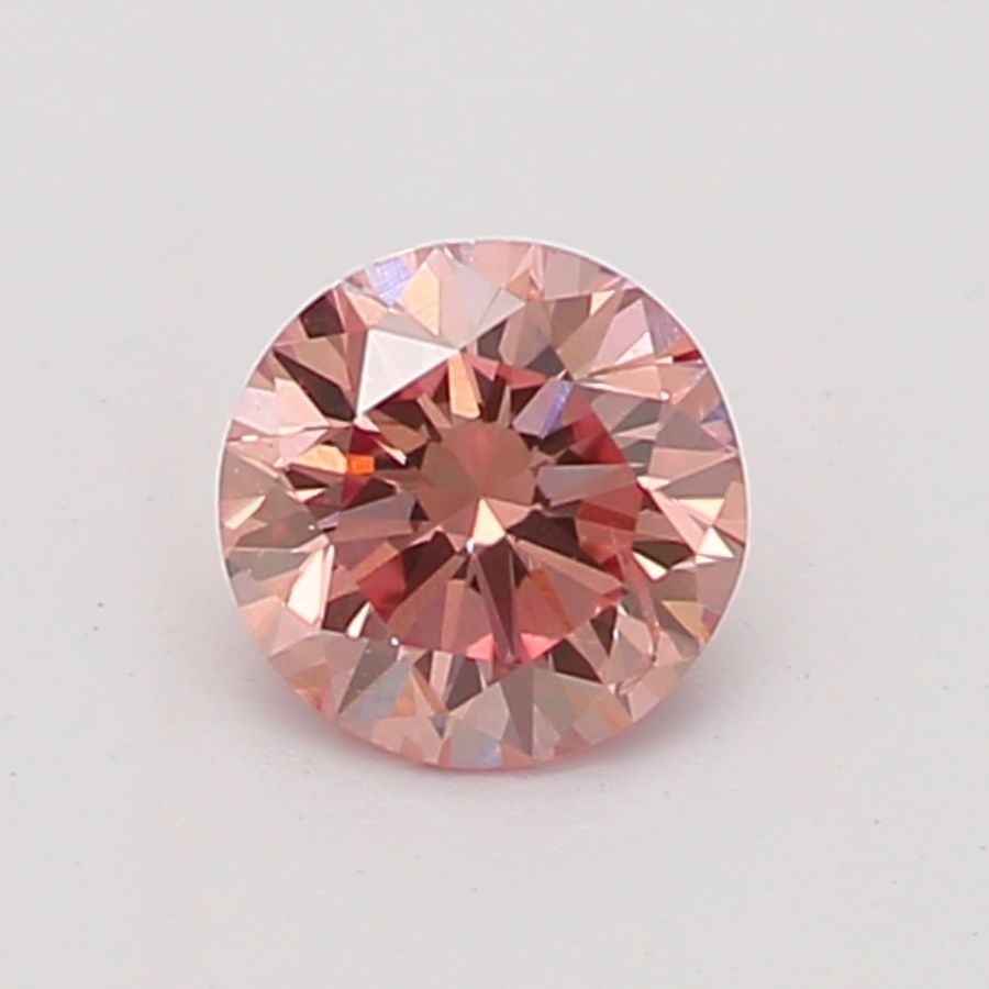 Loose Diamond - ROUND 0.15ct Fancy Orangey Pink SI2: Loose Diamond - ROUND 0.15ct Fancy Orangey Pink SI2 Source: Natural Shape: ROUND Carats: 0.15 Color: Fancy Orangey Pink Certification: NONE Video: