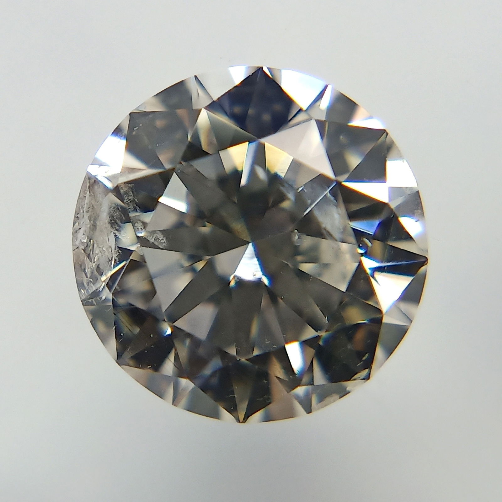 Loose Diamond - ROUND 1.02ct Faint Pinkish Brown I1: Loose Diamond - ROUND 1.02ct Faint Pinkish Brown I1 Source: Natural Shape: ROUND Carats: 1.02 Color: Faint Pinkish Brown Certification: GIA The Diamond Depot Guarantee: All items in this auction are g