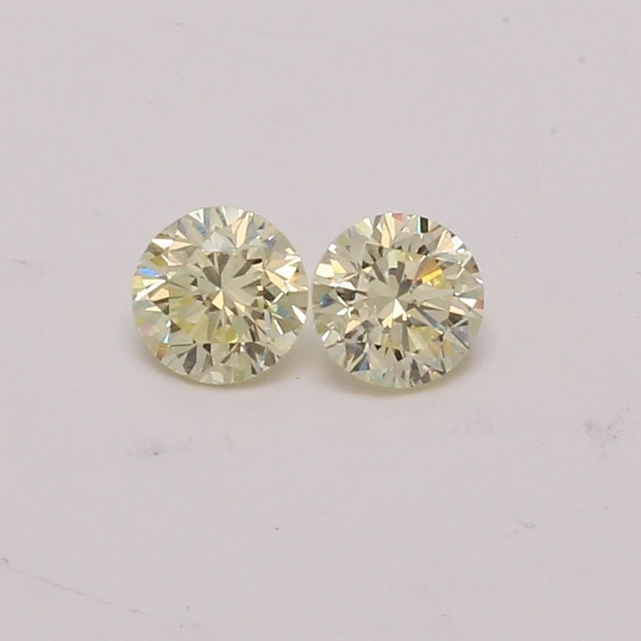 Loose Diamond - ROUND 0.49ct Light Yellow VS1: Loose Diamond - ROUND 0.49ct Light Yellow VS1 Source: Natural Shape: ROUND Carats: 0.49 Color: Light Yellow Certification: NONE Video: