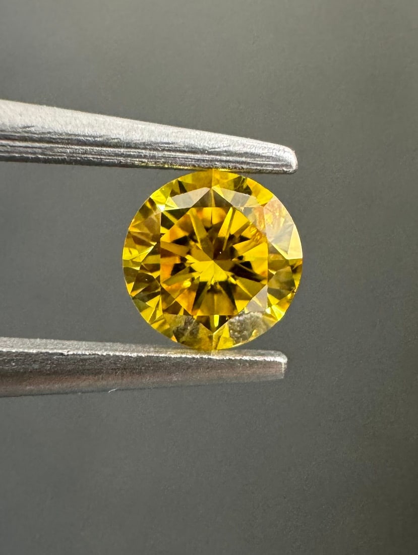 Loose Diamond - ROUND 0.24ct Fancy Vivid Orangey Yellow I1: Loose Diamond - ROUND 0.24ct Fancy Vivid Orangey Yellow I1 Source: Natural Shape: ROUND Carats: 0.24 Color: Fancy Vivid Orangey Yellow Certification: GIA Video: