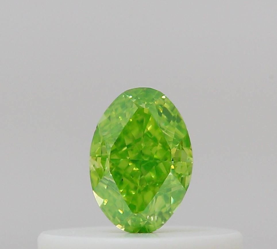 Loose Diamond - OVAL 0.22ct Fancy Vivid Yellowish Green VS2: Loose Diamond - OVAL 0.22ct Fancy Vivid Yellowish Green VS2 Source: Natural Shape: OVAL Carats: 0.22 Color: Fancy Vivid Yellowish Green Certification: GIA Video: