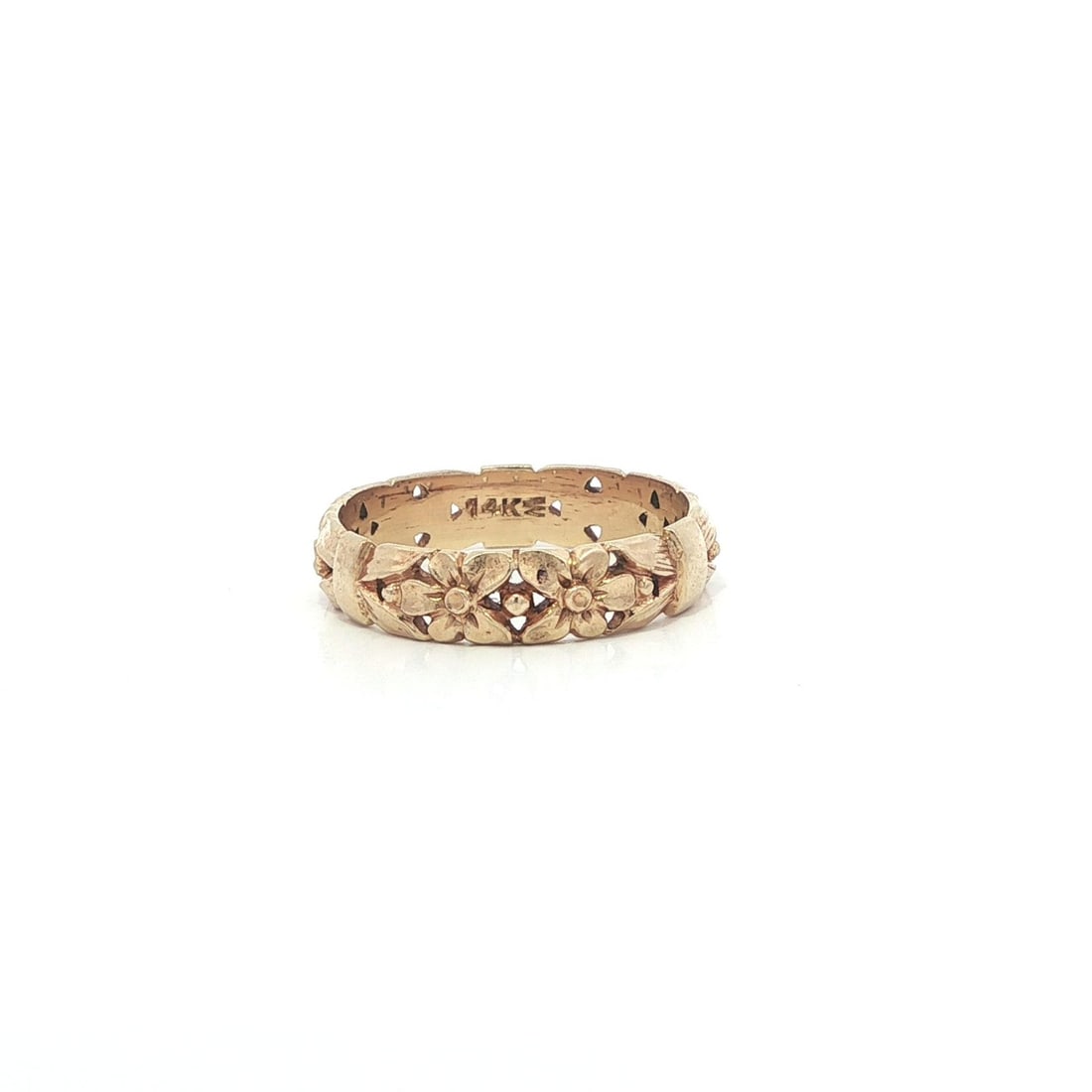 Solid 14k Yellow Gold Floral Openwork Eternity Band Ring Size 4.5: Solid 14k Yellow Gold Floral Openwork Eternity Band Ring Size 4.5 This vintage eternity band ring features open work floral detailing crafted in solid 13-14k yellow gold, stamped 14k. The ring is a si