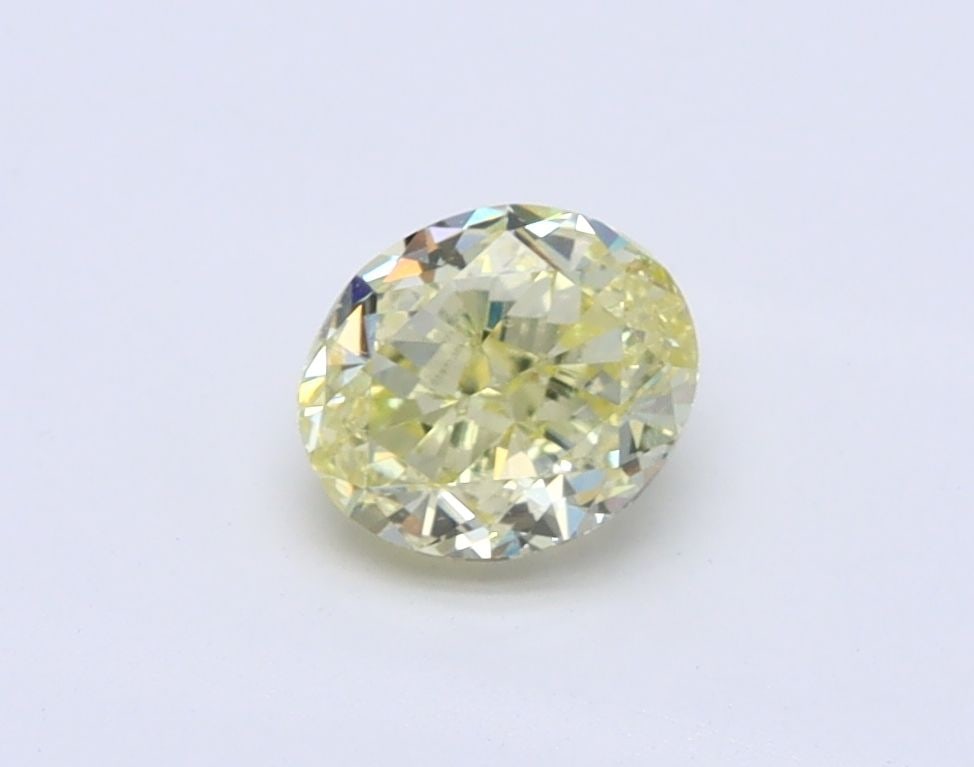 Loose Diamond - OVAL 0.52ct Fancy Light Yellow VS1: Loose Diamond - OVAL 0.52ct Fancy Light Yellow VS1 Source: Natural Shape: OVAL Carats: 0.52 Color: Fancy Light Yellow Certification: GIA Video: