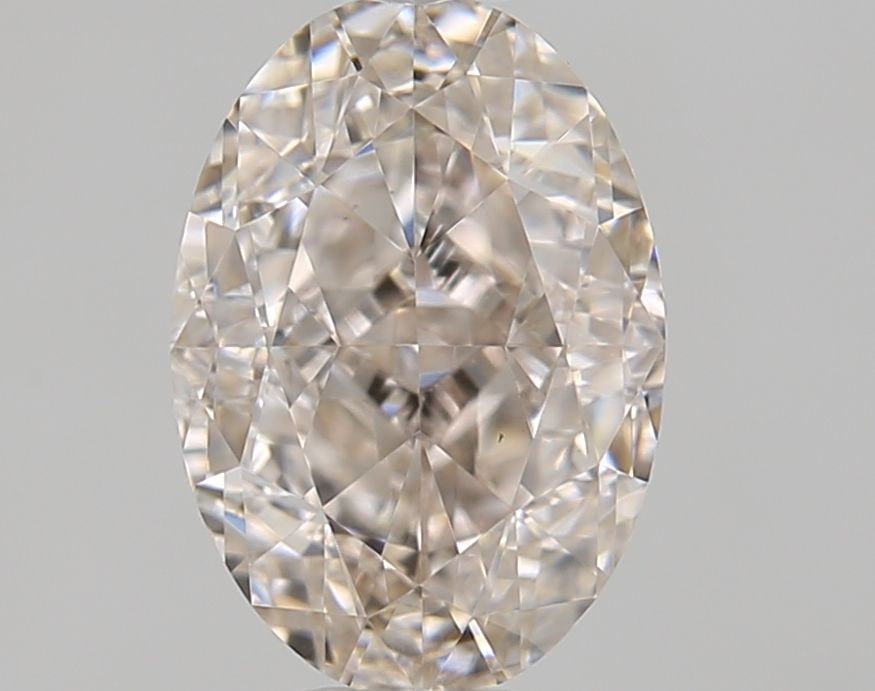 Loose Diamond - OVAL 0.7ct Fancy Light Pink Brown VS2: Loose Diamond - OVAL 0.7ct Fancy Light Pink Brown VS2 Source: Natural Shape: OVAL Carats: 0.7 Color: Fancy Light Pink Brown Certification: NONE Video: