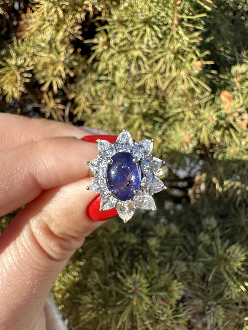 Platinum 6.83ctw GIA No Heat Burma Star Sapphire Diamond Ring: Platinum 6.83ctw GIA No Heat Burma Star Sapphire Diamond Ring This exquisite cocktail ring features a stunning natural star sapphire, renowned for its unique color-changing properties from blue to vio