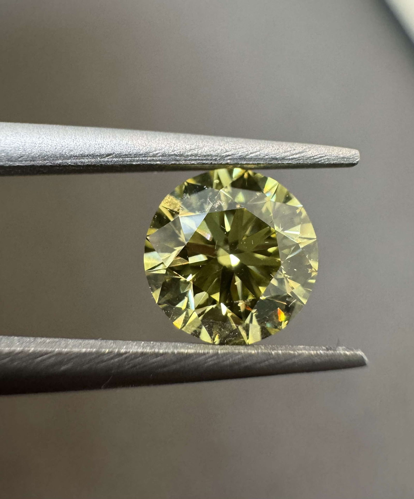 Loose Diamond - ROUND 0.74ct Fancy Intense Yellow SI1: Loose Diamond - ROUND 0.74ct Fancy Intense Yellow SI1 Source: Natural Shape: ROUND Carats: 0.74 Color: Fancy Intense Yellow Certification: GIA Video: