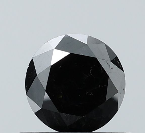 Loose Diamond - ROUND 0.69ct Fancy Black VS2: Loose Diamond - ROUND 0.69ct Fancy Black VS2 Source: Natural Shape: ROUND Carats: 0.69 Color: Fancy Black Certification: NONE Video: