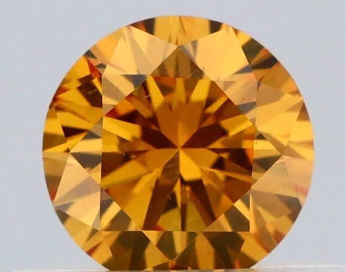 Loose Diamond - ROUND 0.34ct Fancy Vivid Orangy Yellow VS2: Loose Diamond - ROUND 0.34ct Fancy Vivid Orangy Yellow VS2 Source: Natural Shape: ROUND Carats: 0.34 Color: Fancy Vivid Orangy Yellow Certification: GIA Video: