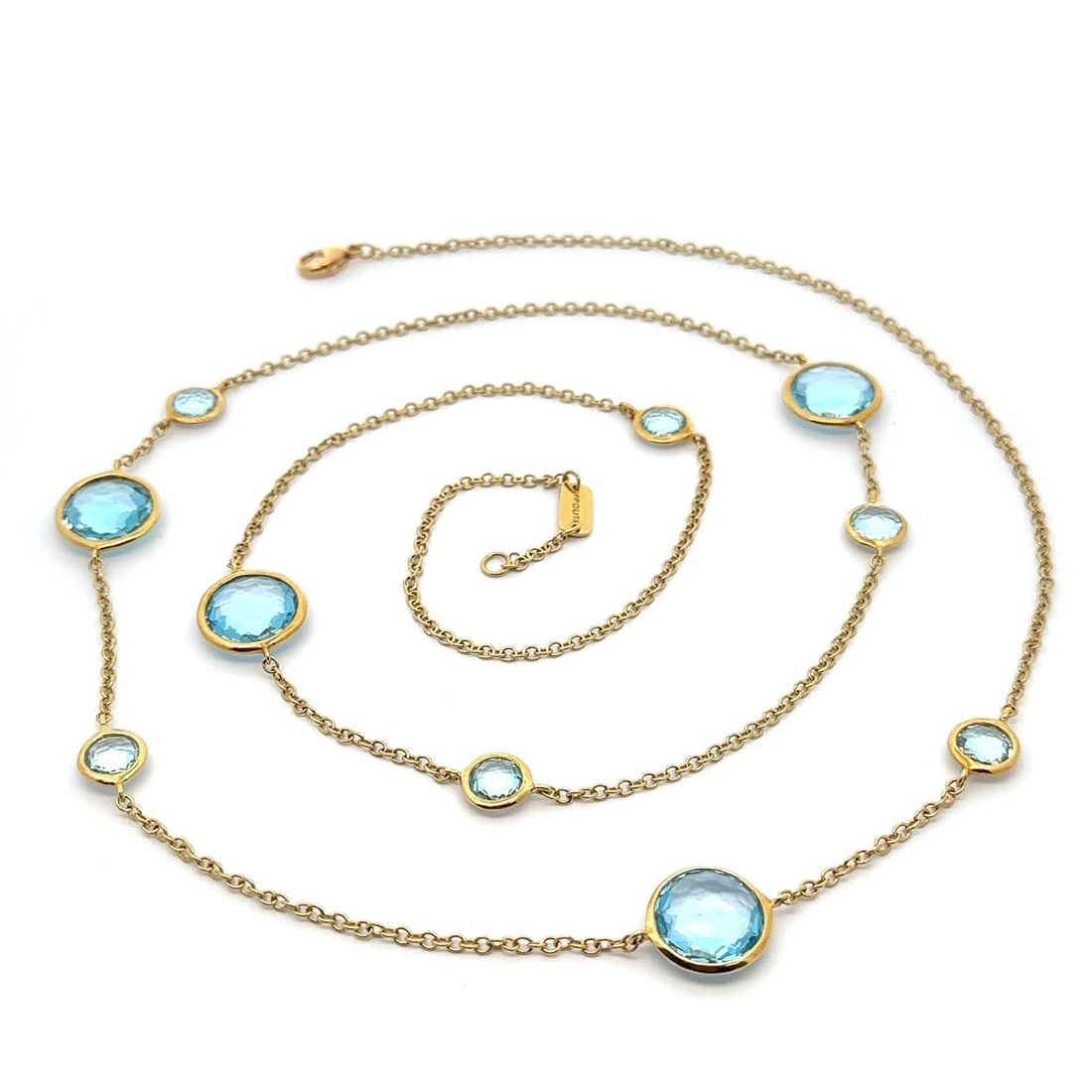 Ippolita 18k Yellow Gold 37 Inch Blue Topaz Rock Candy Necklace: Ippolita 18k Yellow Gold 37 Inch Blue Topaz Rock Candy Necklace Elevate your style with this stunning Ippolita 18k Yellow Gold Blue Topaz Rock Candy Wrap Necklace. This exquisite piece features ten na