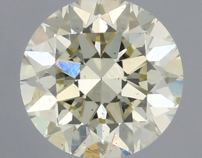 Loose Diamond - ROUND 0.61ct S-T VS2: Loose Diamond - ROUND 0.61ct S-T VS2 Source: Natural Shape: ROUND Carats: 0.61 Color: S-T Certification: IGI Video: