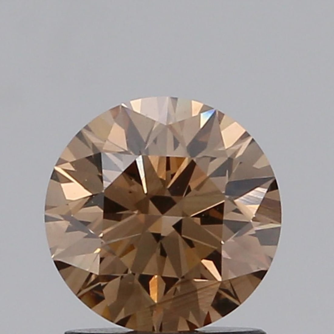 Loose Diamond - ROUND 1.06ct Brown VS1: Loose Diamond - ROUND 1.06ct Brown VS1 Source: Natural Shape: ROUND Carats: 1.06 Color: Brown Certification: NONE Video: