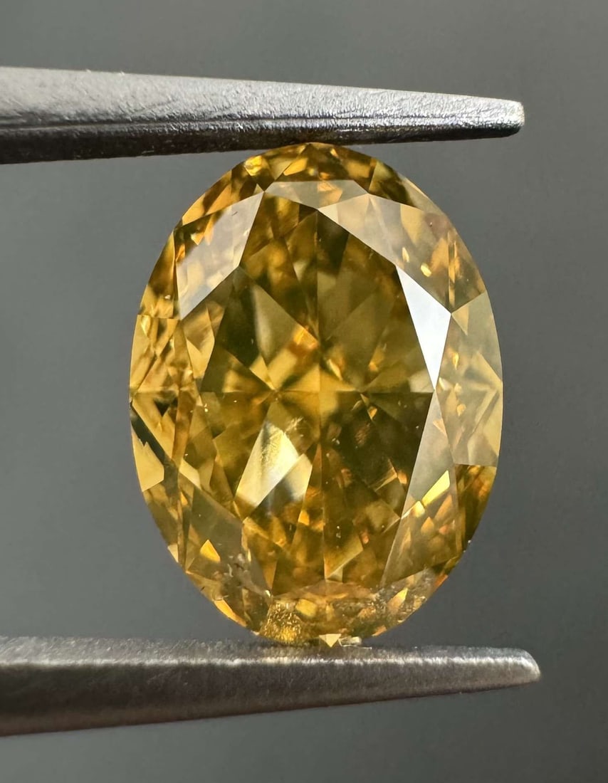 Loose Diamond - OVAL 1.03ct Fancy Deep Brownish Orangey Yellow VS1: Loose Diamond - OVAL 1.03ct Fancy Deep Brownish Orangey Yellow VS1 Source: Natural Shape: OVAL Carats: 1.03 Color: Fancy Deep Brownish Orangey Yellow Certification: GIA Video: