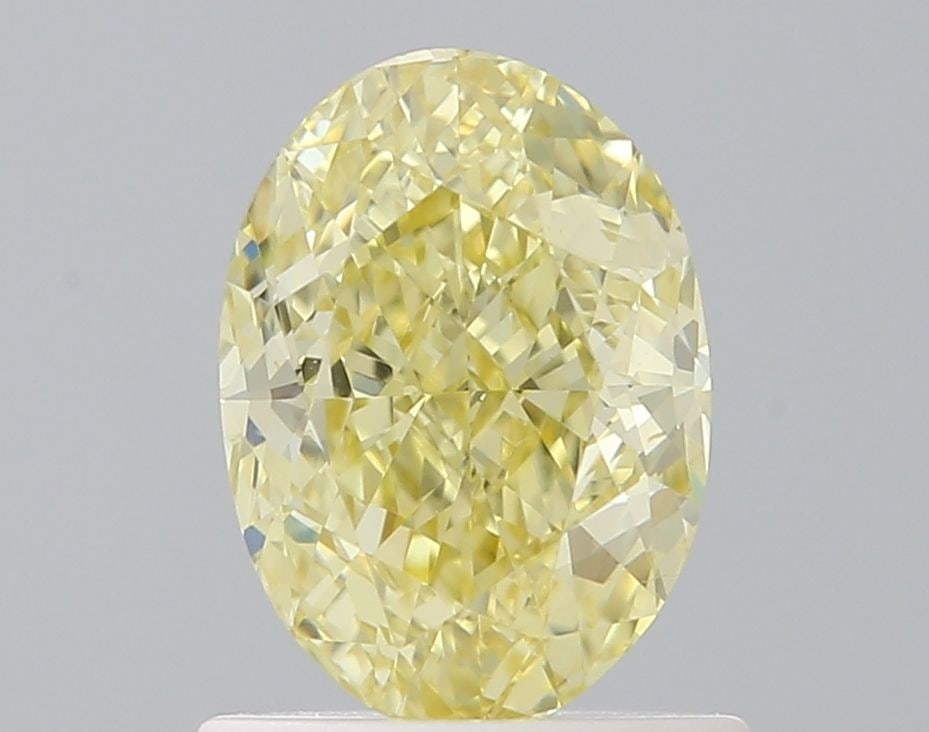 Loose Diamond - OVAL 1.01ct Fancy Yellow VS1: Loose Diamond - OVAL 1.01ct Fancy Yellow VS1 Source: Natural Shape: OVAL Carats: 1.01 Color: Fancy Yellow Certification: GIA Video: