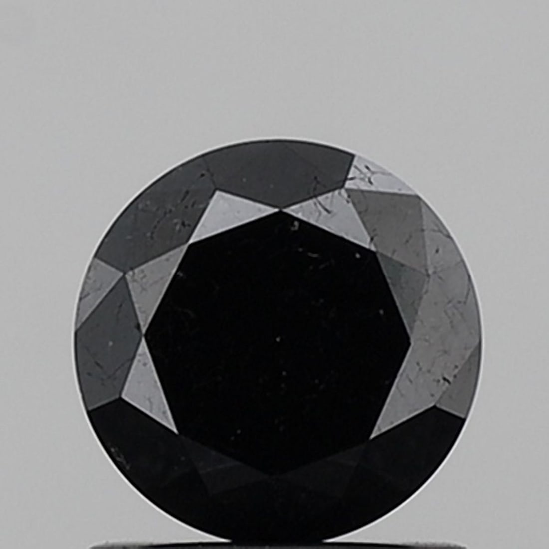 Loose Diamond - ROUND 1.25ct Fancy Black VVS2: Loose Diamond - ROUND 1.25ct Fancy Black VVS2 Source: Natural Shape: ROUND Carats: 1.25 Color: Fancy Black Certification: NONE Video: