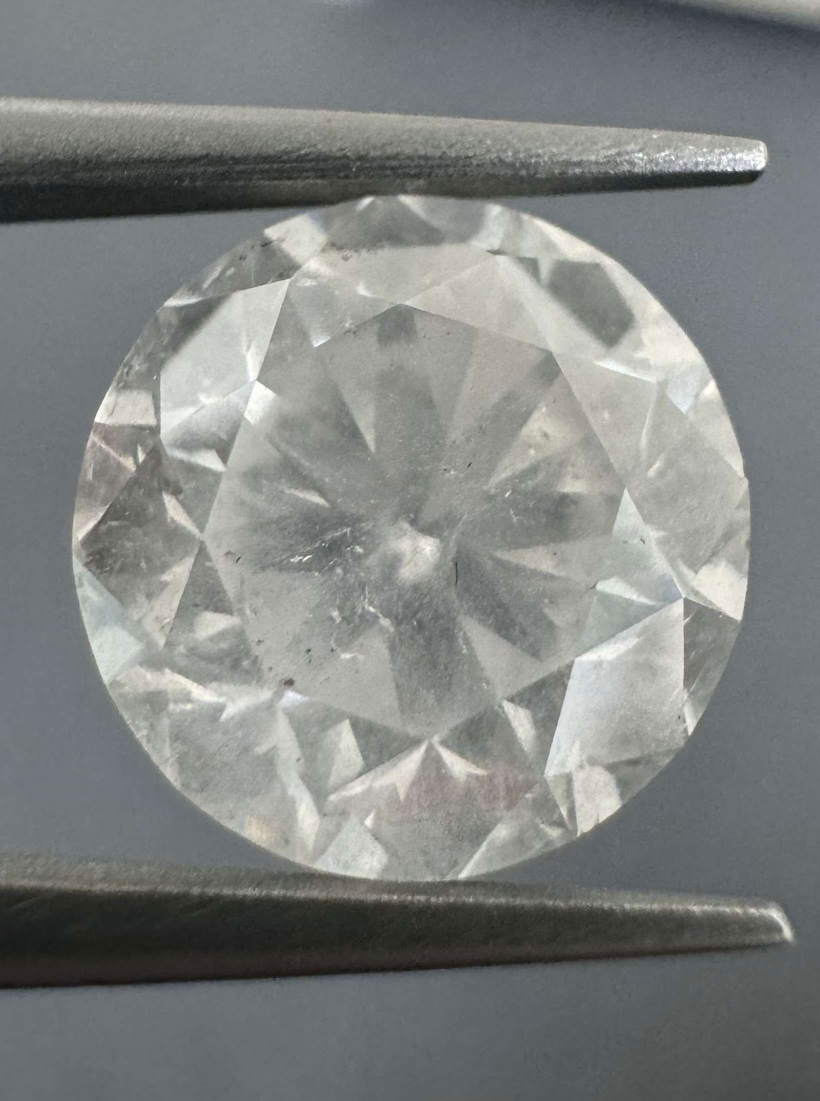 Loose Diamond - ROUND 4.16ct Fancy White I3: Loose Diamond - ROUND 4.16ct Fancy White I3 Source: Natural Shape: ROUND Carats: 4.16 Color: Fancy White Certification: GIA Video: