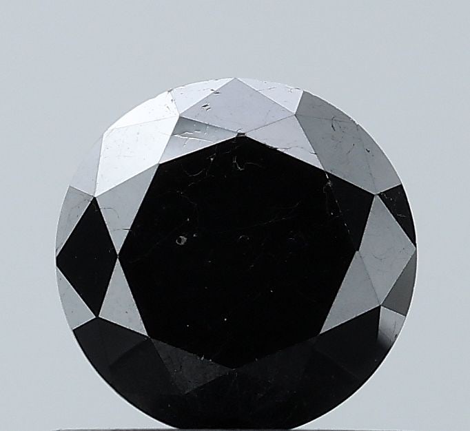 Loose Diamond - ROUND 0.77ct Black VS2: Loose Diamond - ROUND 0.77ct Black VS2 Source: Natural Shape: ROUND Carats: 0.77 Color: Black Certification: NONE Video: