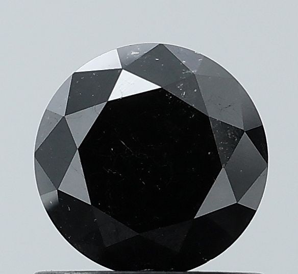 Loose Diamond - ROUND 0.84ct Fancy Black VS1: Loose Diamond - ROUND 0.84ct Fancy Black VS1 Source: Natural Shape: ROUND Carats: 0.84 Color: Fancy Black Certification: NONE Video: