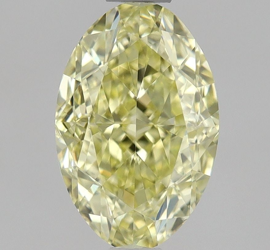 Loose Diamond - OVAL 1.0ct Fancy Yellow VS1: Loose Diamond - OVAL 1.0ct Fancy Yellow VS1 Source: Natural Shape: OVAL Carats: 1.0 Color: Fancy Yellow Certification: GIA The Diamond Depot Guarantee: All items in this auction are guaranteed to be 1