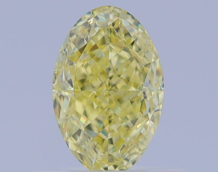 Loose Diamond - OVAL 0.69ct Fancy Yellow VVS2: Loose Diamond - OVAL 0.69ct Fancy Yellow VVS2 Source: Natural Shape: OVAL Carats: 0.69 Color: Fancy Yellow Certification: GIA Video: