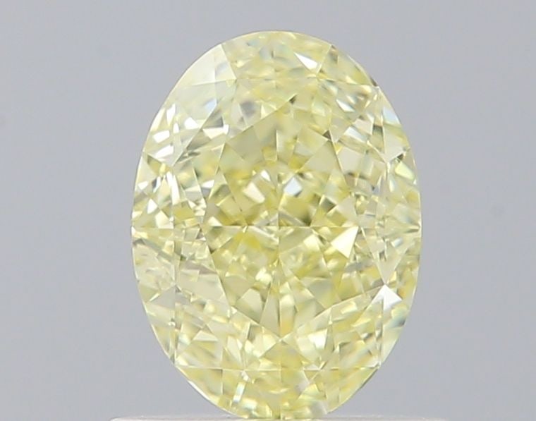 Loose Diamond - OVAL 0.76ct Fancy Light Yellow VVS2: Loose Diamond - OVAL 0.76ct Fancy Light Yellow VVS2 Source: Natural Shape: OVAL Carats: 0.76 Color: Fancy Light Yellow Certification: GIA Video: