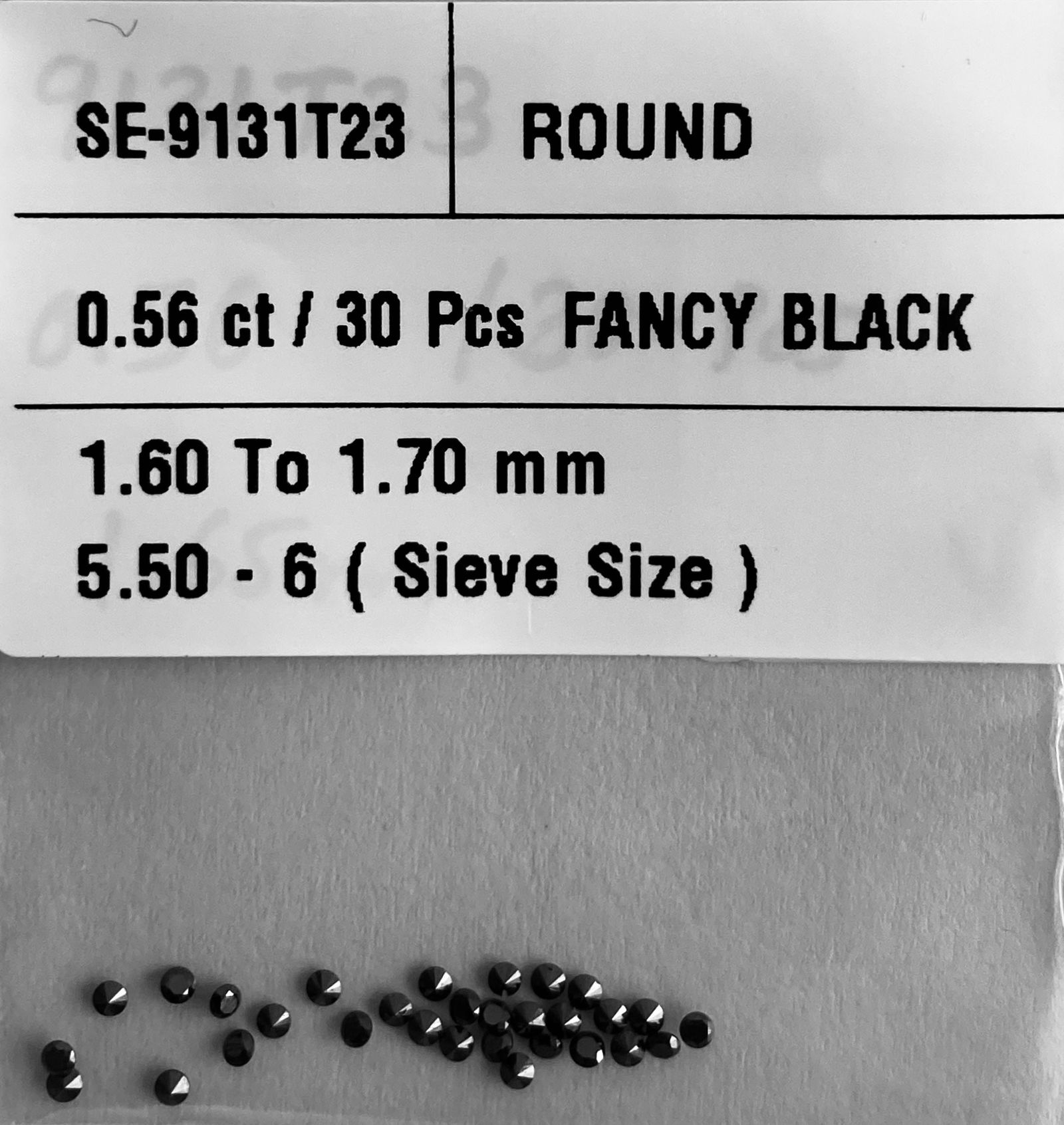 Loose Diamond - ROUND 0.56ct Fancy Black VVS2: Loose Diamond - ROUND 0.56ct Fancy Black VVS2 Source: Natural Shape: ROUND Carats: 0.56 Color: Fancy Black Certification: NONE The Diamond Depot Guarantee: All items in this auction are guaranteed to
