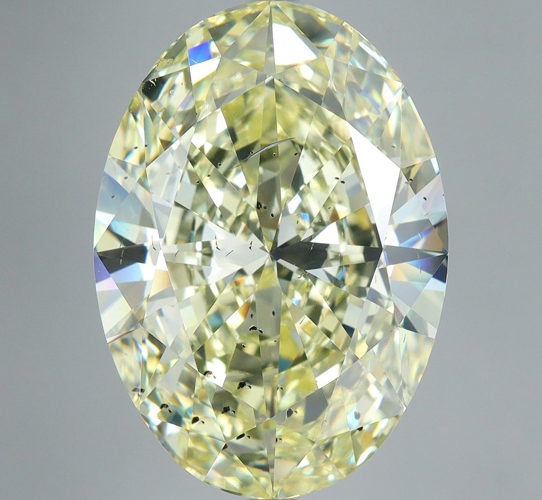 Loose Diamond - OVAL 12.03ct Faint Yellow SI2: Loose Diamond - OVAL 12.03ct Faint Yellow SI2 Source: Natural Shape: OVAL Carats: 12.03 Color: Faint Yellow Certification: GIA Video: