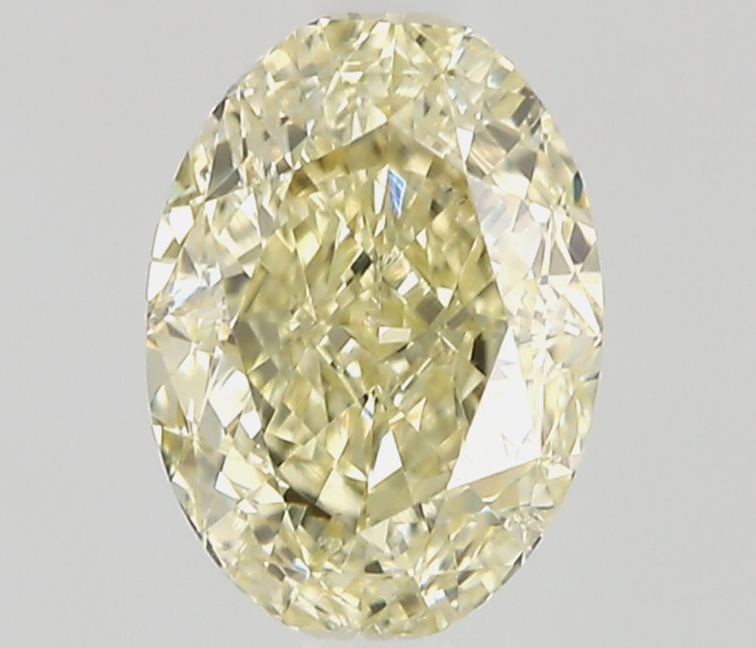 Loose Diamond - OVAL 0.51ct Fancy Light Yellow SI2: Loose Diamond - OVAL 0.51ct Fancy Light Yellow SI2 Source: Natural Shape: OVAL Carats: 0.51 Color: Fancy Light Yellow Certification: GIA Video: