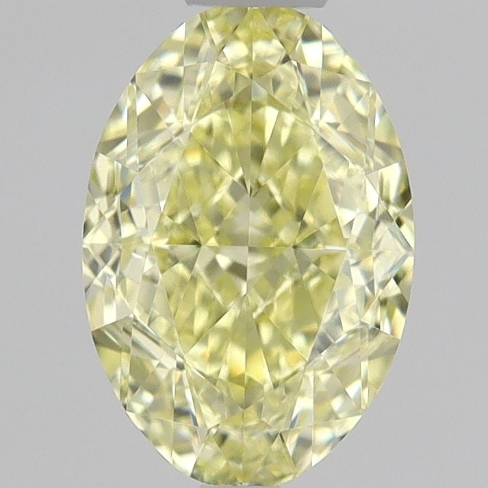 Loose Diamond - OVAL 0.67ct Fancy Yellow VVS2: Loose Diamond - OVAL 0.67ct Fancy Yellow VVS2 Source: Natural Shape: OVAL Carats: 0.67 Color: Fancy Yellow Certification: GIA The Diamond Depot Guarantee: All items in this auction are guaranteed to b