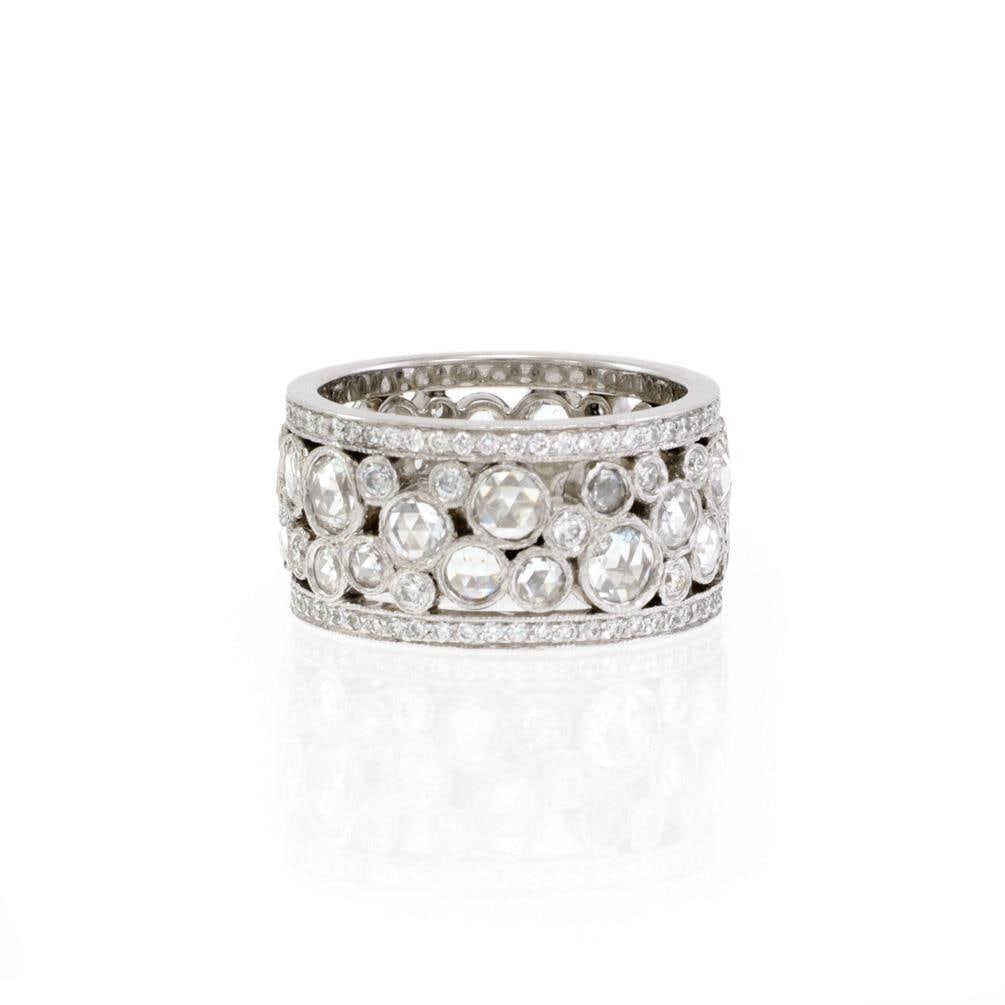 Tiffany & Co. Cobblestone Platinum Diamond Band Ring 10mm Wide: Tiffany & Co. Cobblestone Platinum Diamond Band Ring 10mm Wide This elegant wide band ring from Tiffany & Co.'s Cobblestone Collection showcases a sophisticated design crafted in platinum. The 10mm wi